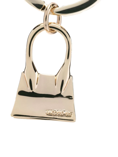 Shop Jacquemus Embossed-logo Polished-effect Keychain In Gold