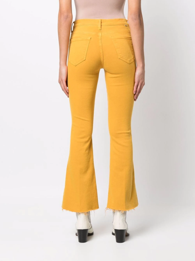 Shop Mother Cropped Flared Jeans In Yellow