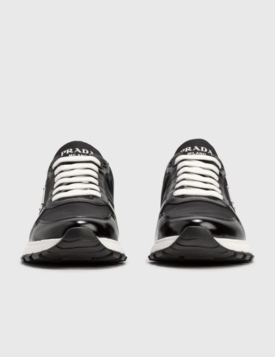 Prada Prax 1 Sneakers In Re-nylon And Brushed Leather In Black | ModeSens
