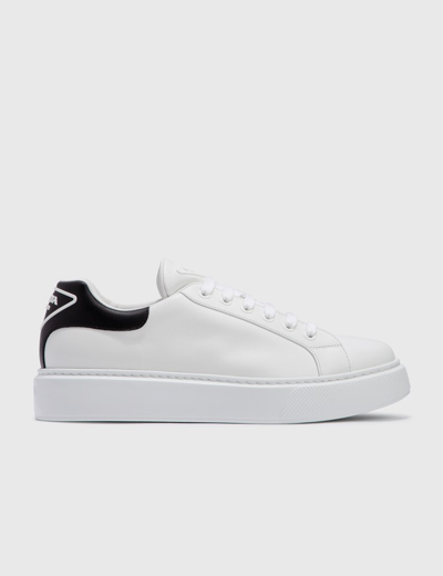 Shop Prada Macro Leather Sneaker In White