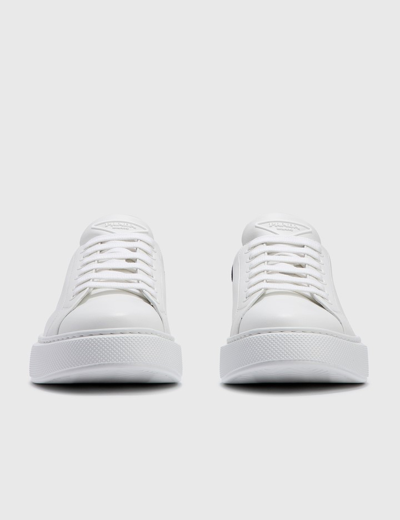 Shop Prada Macro Leather Sneaker In White