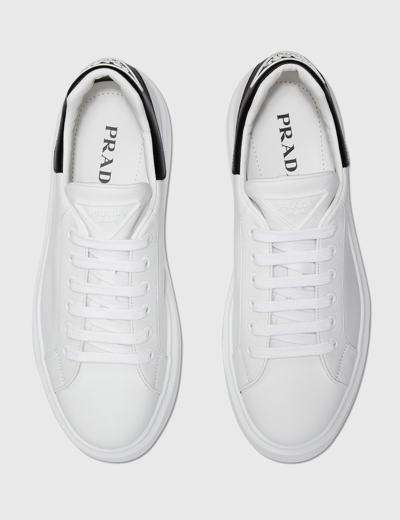 Shop Prada Macro Leather Sneaker In White