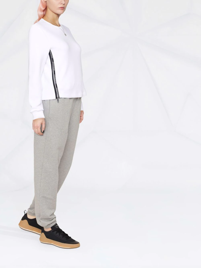 Shop Emporio Armani Logo-trim Long-sleeved Sweatshirt In White