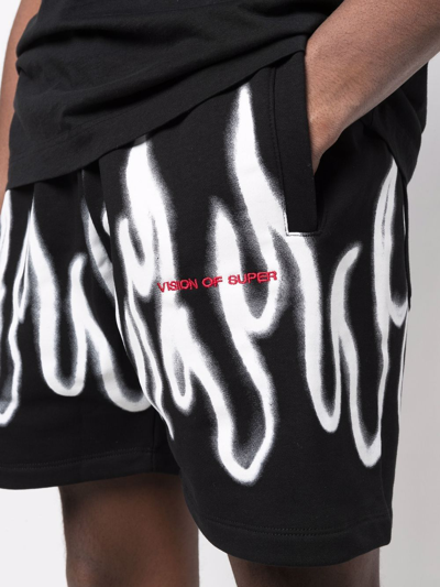 Shop Vision Of Super Flame-print Track Shorts In Black