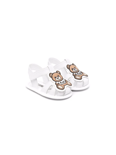 Shop Moschino Toy Teddy Logo Sandals In White