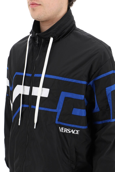 Shop Versace Greca Light Windbreaker Jacket In Black,blue,white