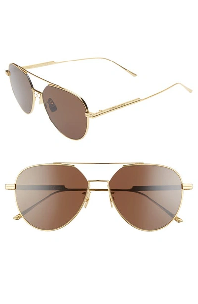 Shop Bottega Veneta 57mm Aviator Sunglasses In Gold/ Brown