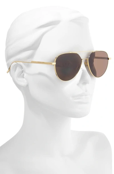 Shop Bottega Veneta 57mm Aviator Sunglasses In Gold/ Brown