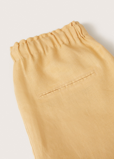 Shop Mango 100% Linen Trousers Yellow