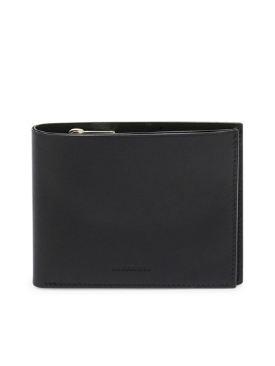 Shop Jil Sander Logo Embossed Wallet In Black