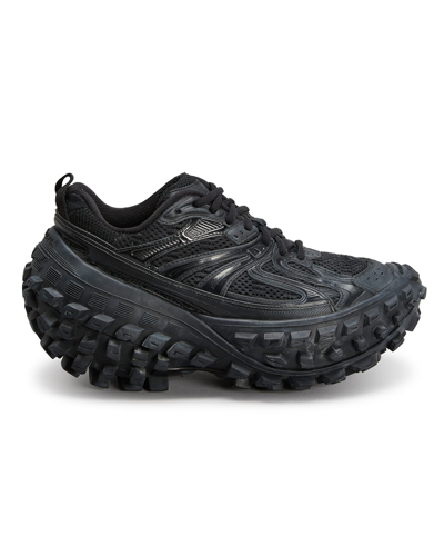 Shop Balenciaga Defender Exaggerated Runner Sneakers In 1000 Black