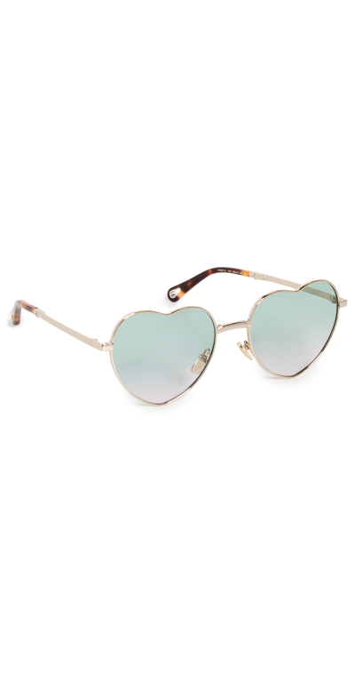 Shop Chloé Milane Heart Sunglasses In Gold Gold Green