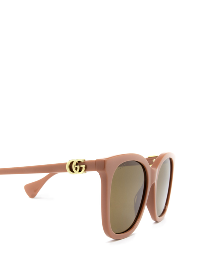 Shop Gucci Gg1071s Pink Female Sunglasses