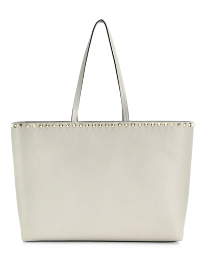 Shop Valentino Rockstud Leather Tote In Light Grey