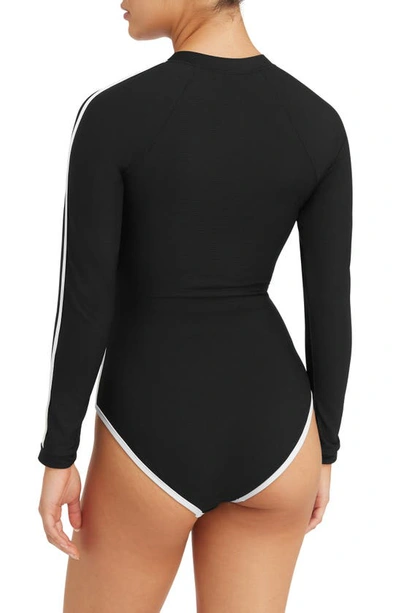 Shop Sea Level Long Sleeve Rashguard Swimsuit In Black