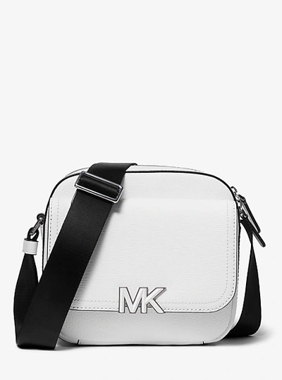 Shop Michael Kors Hudson Textured Leather Messenger Bag In White