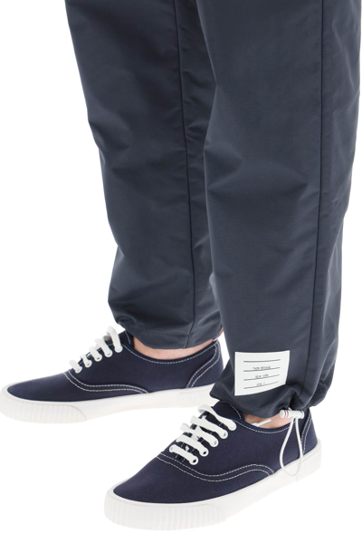 Shop Thom Browne Track Pants In Sustainable Ripstop In Blue,white