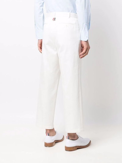 Shop Thom Browne Floral Applique Trousers In White