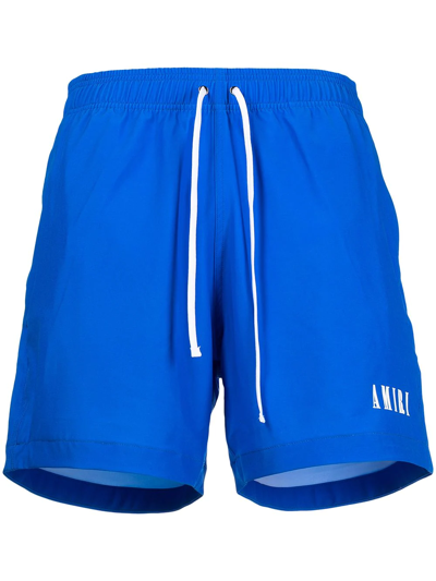 Shop Amiri Logo-print Swim Shorts In Blau