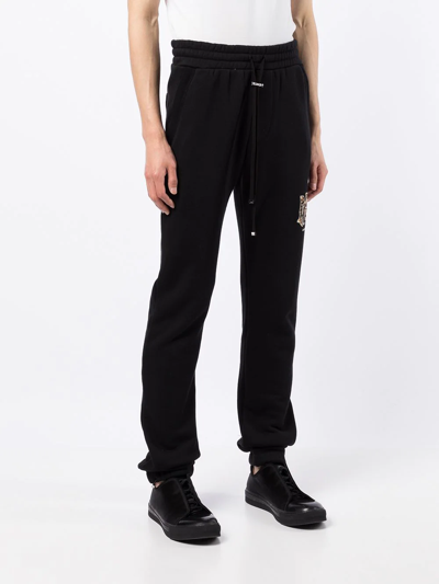 Amiri Tiger Logo-print Cotton-jersey Track Pants In Black