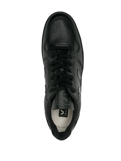 Shop Veja V-10 Low Top Sneakers In Black