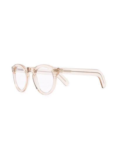 Shop Cutler And Gross Transparent Round-frame Glasses In Nude