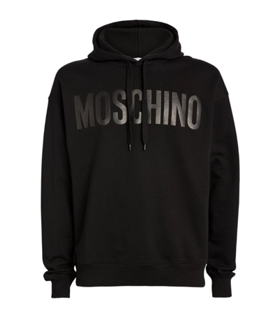 Shop Moschino Logo Hoodie In Black