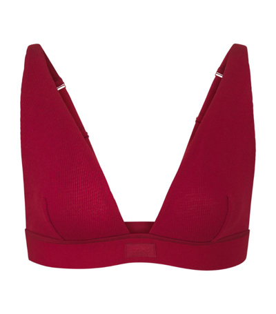 Shop Skims Cotton-blend Ribbed Plunge Bralette In Red