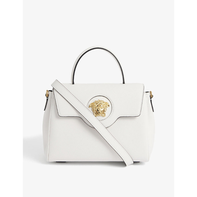Shop Versace La Medusa Leather Shoulder Bag In White Gold