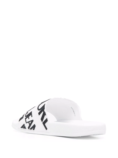 Shop Versace Jeans Couture Diagonal Logo Flat Slides In White