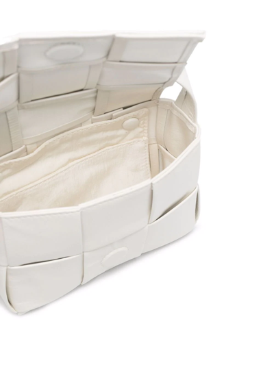 Shop Bottega Veneta Mini Cassette Intrecciato Crossbody Bag In White