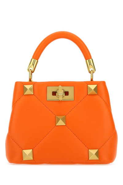 Shop Valentino Garavani Roman Stud Quilted Shoulder Bag In Orange