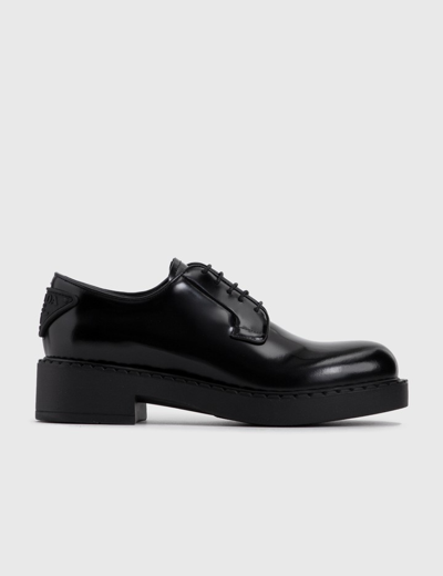 Shop Prada Brushed-leather Derby Shoes In Black