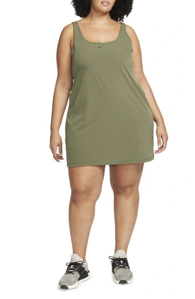 Shop Nike Bliss Lux Tank Romper Dress In Medium Olive/ Clear