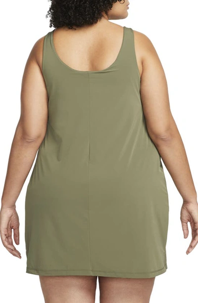 Shop Nike Bliss Lux Tank Romper Dress In Medium Olive/ Clear