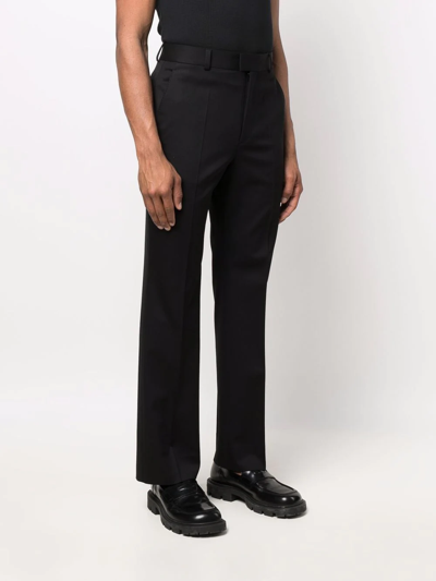 Shop Valentino High-waisted Tailored Trousers In Black