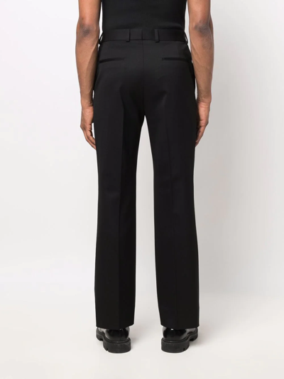 Shop Valentino High-waisted Tailored Trousers In Black