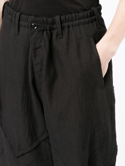 Shop Yohji Yamamoto Drop-crotch Cropped Trousers In Black