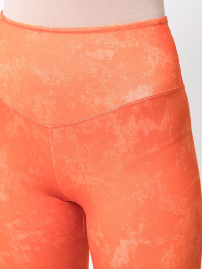 Shop Dependance Washed-effect Leggings In Orange