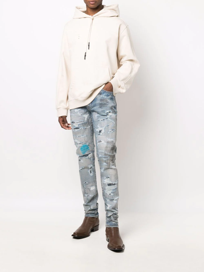 Shop Amiri Distressed-finish Skinny Jeans In Blue