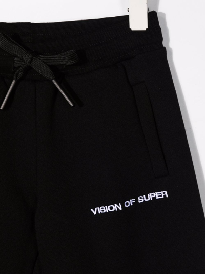 Shop Vision Of Super Flame-print Track Pants In Black