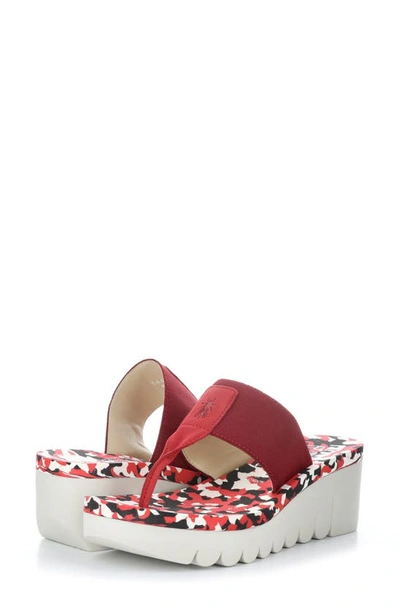 Shop Fly London Yomu Wedge Flip Flop In 007 Lipstick Red Camo