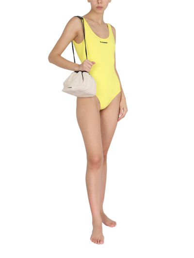 Shop Jil Sander One Piece Swimsuit With Logo Print In Yellow