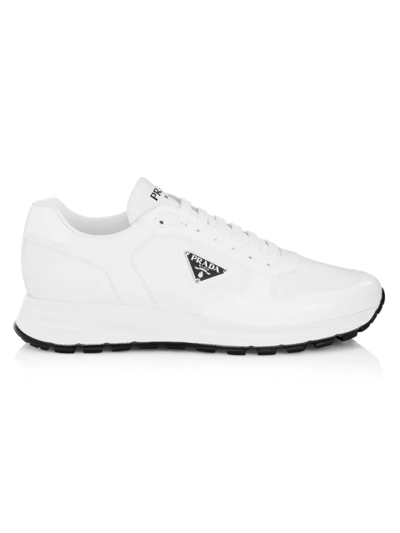 Shop Prada Men's Prax Leather Sneakers In Bianco Nero
