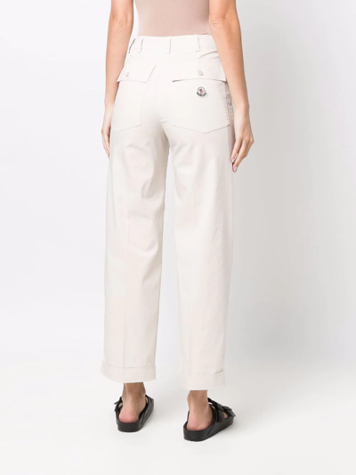 Shop Moncler Rolled-cuff Cropped Trousers In White