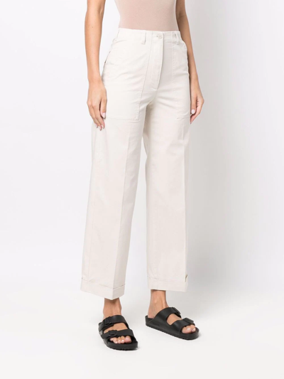 Shop Moncler Rolled-cuff Cropped Trousers In White