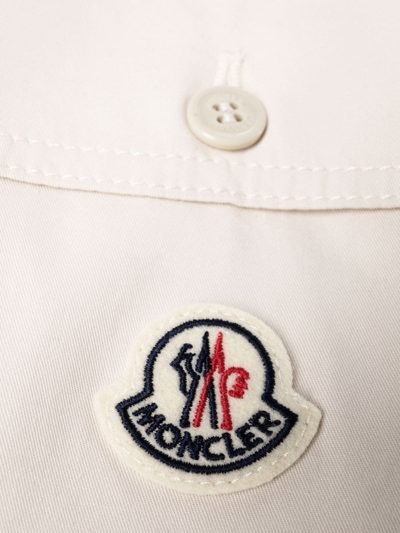 Shop Moncler Rolled-cuff Cropped Trousers In White