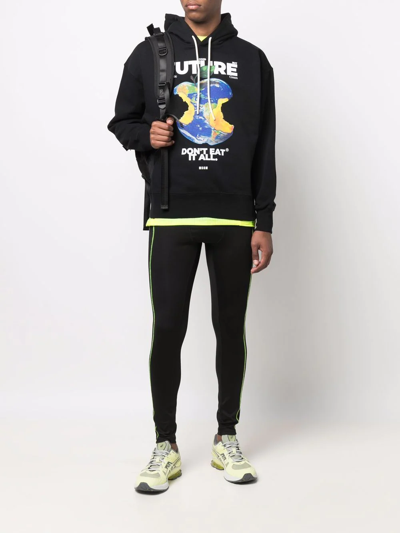 Shop Msgm Logo-print Neon-stitch Leggings In Black