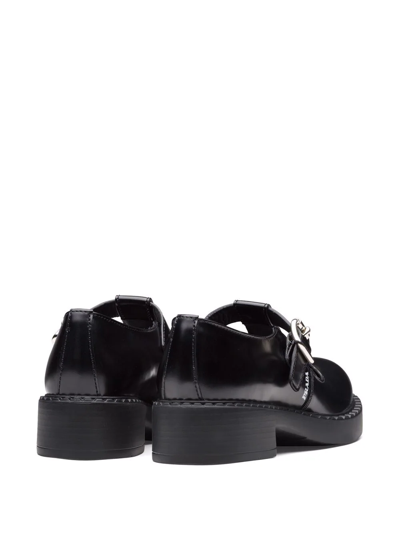 Shop Prada Logo-print Mary-jane Loafers In Black