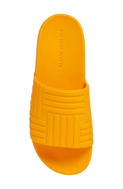 Shop Bottega Veneta Intrecciato Embossed Slide Sandal In Tangerine